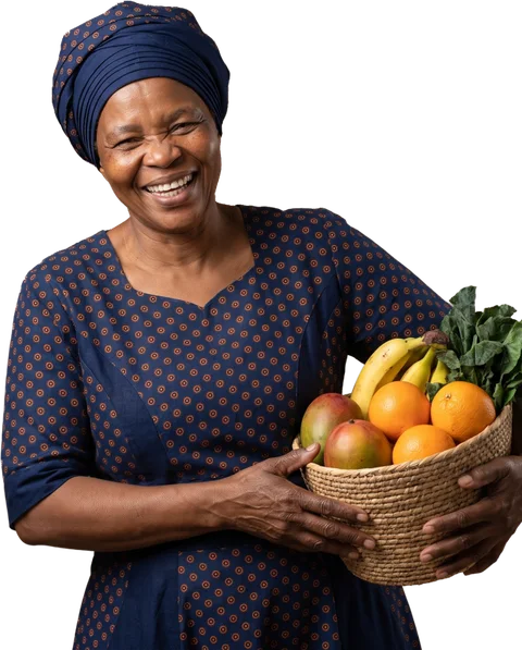 Mwanaisha holding fresh produce.